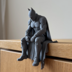 Figurine de Batman assis sur un rebord | Arkham Knight